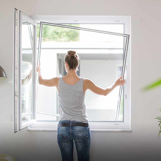 Woman uses stentering frame without tools