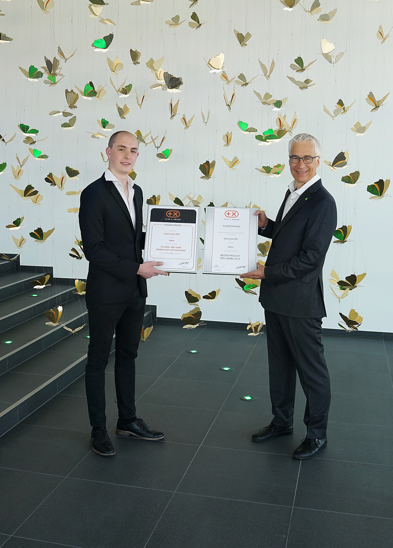 Neher receives Plus Xaward 2018 certificate presentation