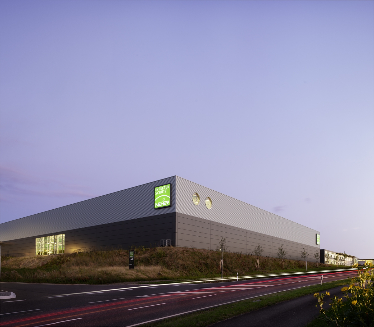 Neher warehouse building with high-bay warehouse at dusk